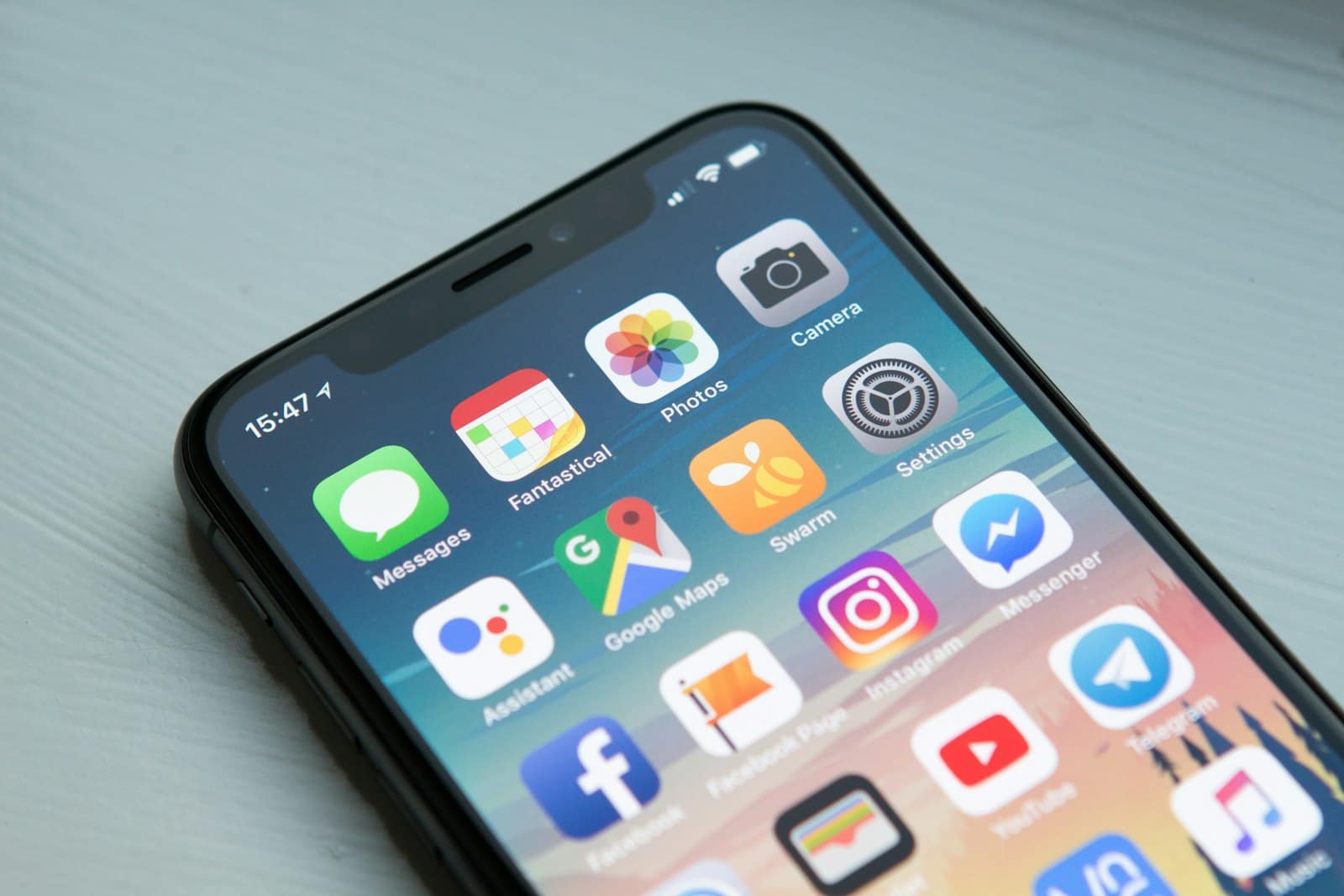 An iPhone home screen filled with app icons