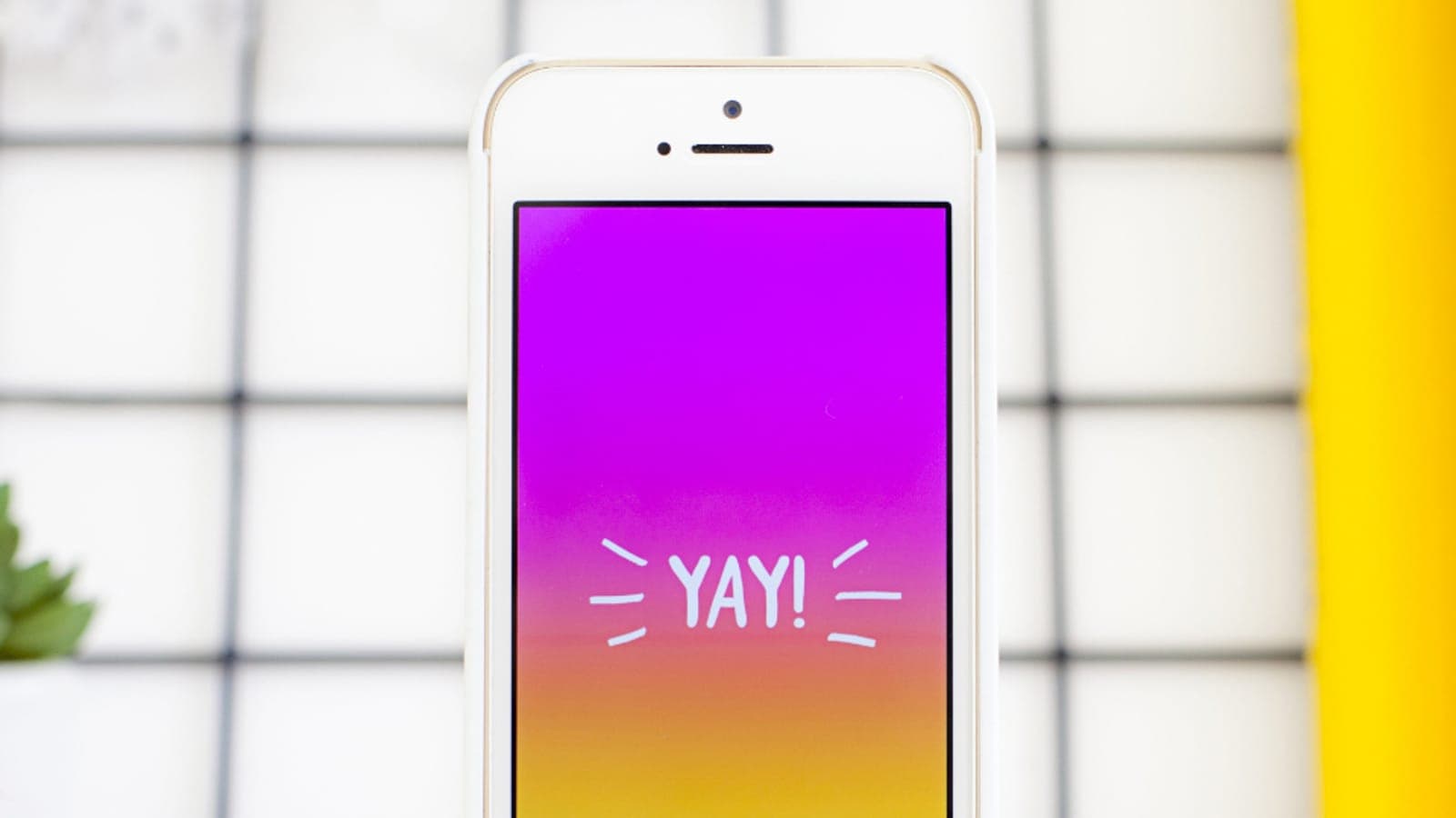 A smartphone displaying a colourful app screen